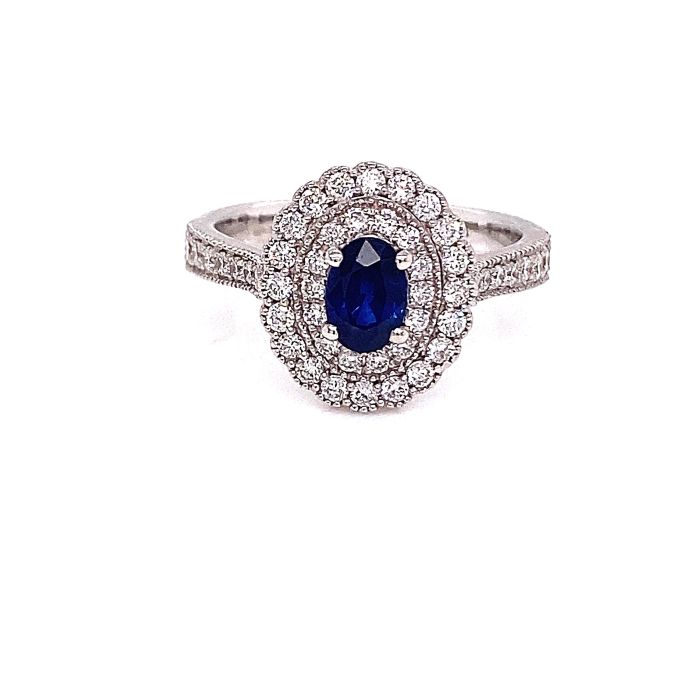 Diamond ring with hot sale two sapphires